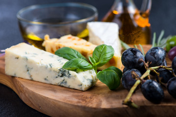 Tapas style board with cheese,olives and wine