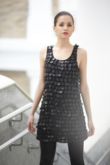Obraz premium girl with a ponytail in black dress