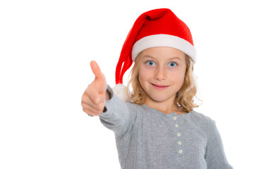 girl with Santa- cap and thumb up