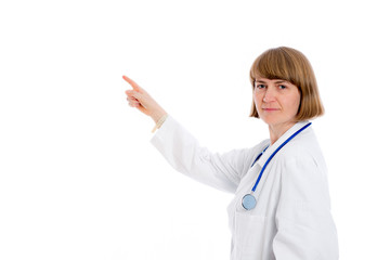 young female doctor is pointing sideways
