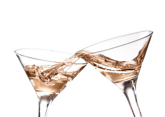 White wine pouring from the bottle intro the glass 