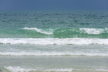 Wave with dark cloudy day sky 