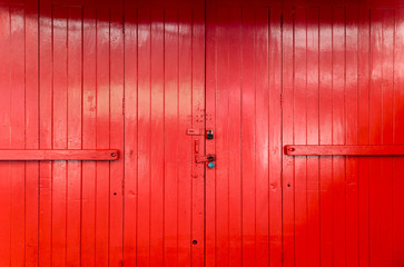Wooden red door background