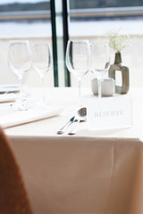 reserved sign on restaurant table 