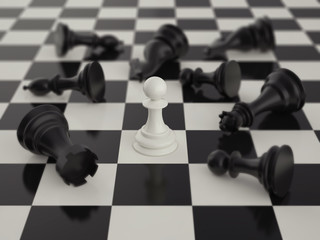 Pawn in the surrounded of black chess pieces with blur