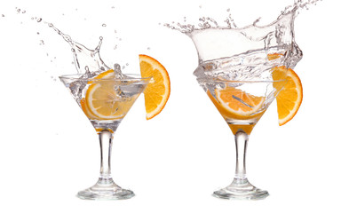 cocktail in a martini glass on a white background with fruit