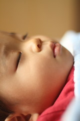 Fototapeta na wymiar 幼児(1歳児)の寝顔
