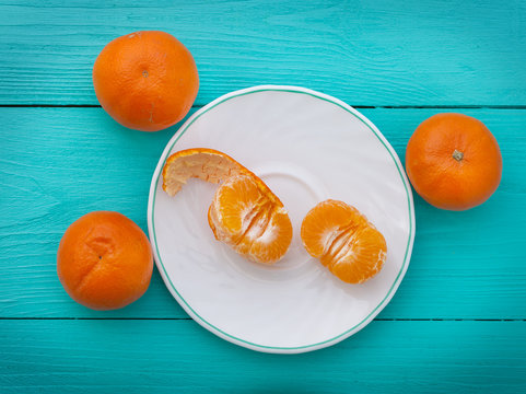 tangerine citrus fruits on tiffany background