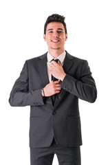 Young businessman confidently posing isolated on white