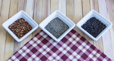 Pepper Seasoning Variety on Red Plaid Napkin