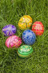 Fototapeta na wymiar Some Colored Easter Eggs in Grass