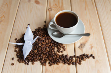 Cup of coffee with crane