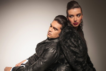 handsome young fashion man leaning on his lover