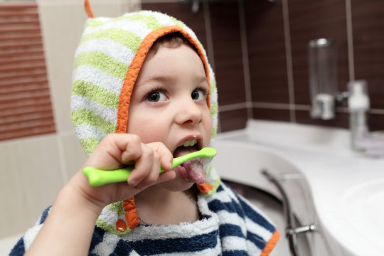 Child Brushing His Teeth