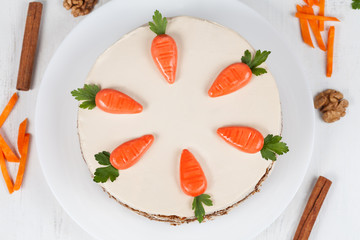 Tasty easter cake with little carrots and cinnamon 