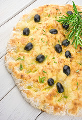 Italian focaccia with olives and rosemary