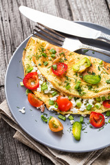 Omelette with vegetables - 82696015