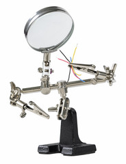 Holder for soldering wires with a lens