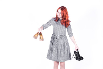 Happy woman looks at the shoes she had bought