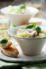 Healthy salad with octopus, celery and potato
