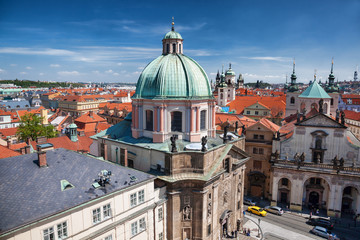 Fototapeta premium Prague with churches in Czech Republic