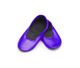 Childrens gym shoes isolated against a white background