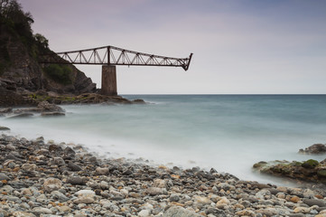 Antique iron and mineral loading dock in the beach cliffs