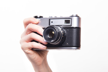 Classic camera in hand