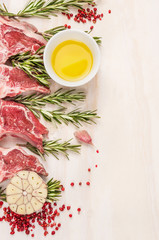 Raw  lamb chops with oil and spices, preparation