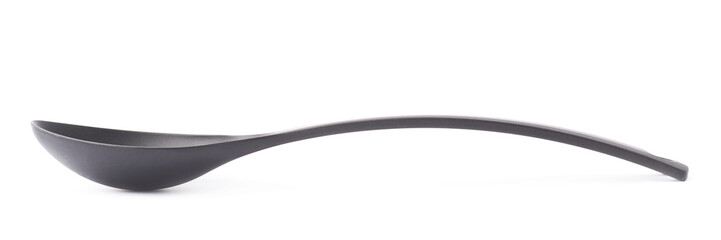 Black plastic kitchen ladle spoon isolated