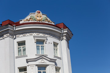 Fototapeta na wymiar Red star soviet symbol on the roof in Tallinn
