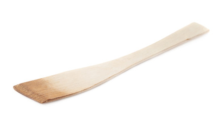 Used wooden spatula tool isolated