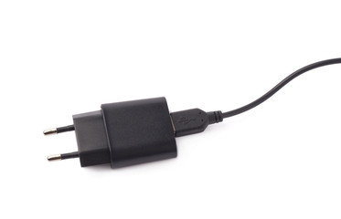 Fragment of the black adapter charger isolated