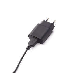 Fragment of the black adapter charger isolated