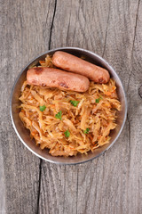 Stew cabbage on wooden table