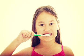 Little girl brushing teeth