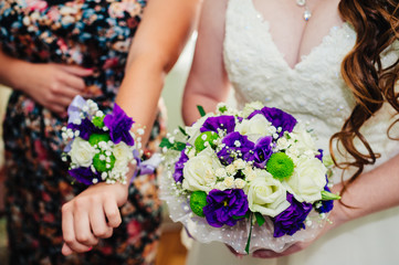 Young wedding couple indoors portrait.