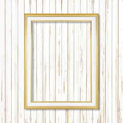 Antique gold frame on white wooden wall ;. Empty picture frame o