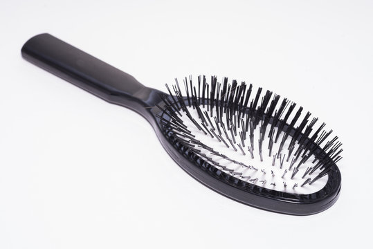 Cepillo de peluquer&iacute;a.