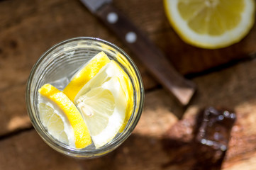 Water with lemon slices and ice