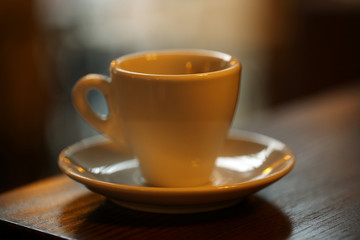 Cup of coffee on table in cafe