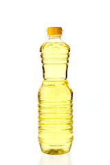 Vegetable oil for cooking in a bottle isolated on white