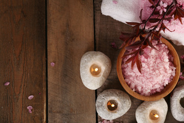 Beautiful spa composition with spring flowers on wooden background