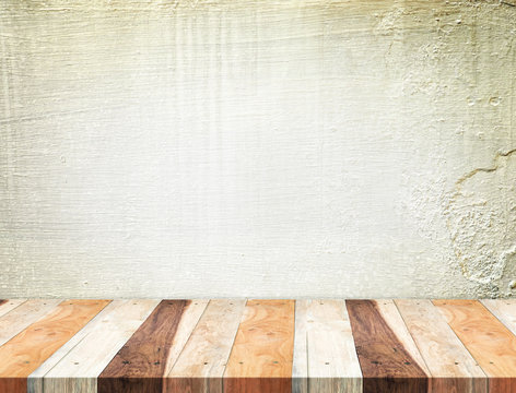 Empty tropical Wooden Table top at grunge concrete wall,Template