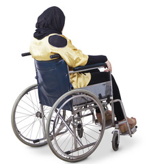 Lonely disabled woman sitting on wheelchair