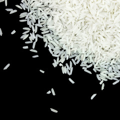  rice on black background, uncooked raw cereals, macro closeup