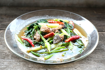 Stir fried kaled with sun dried salted fish