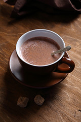 Delicious cocoa in a black cup