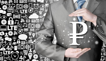 businessman protecting ruble  symbol