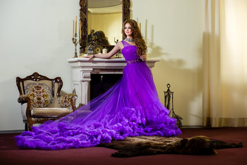 Woman in a luxury, long purple dress